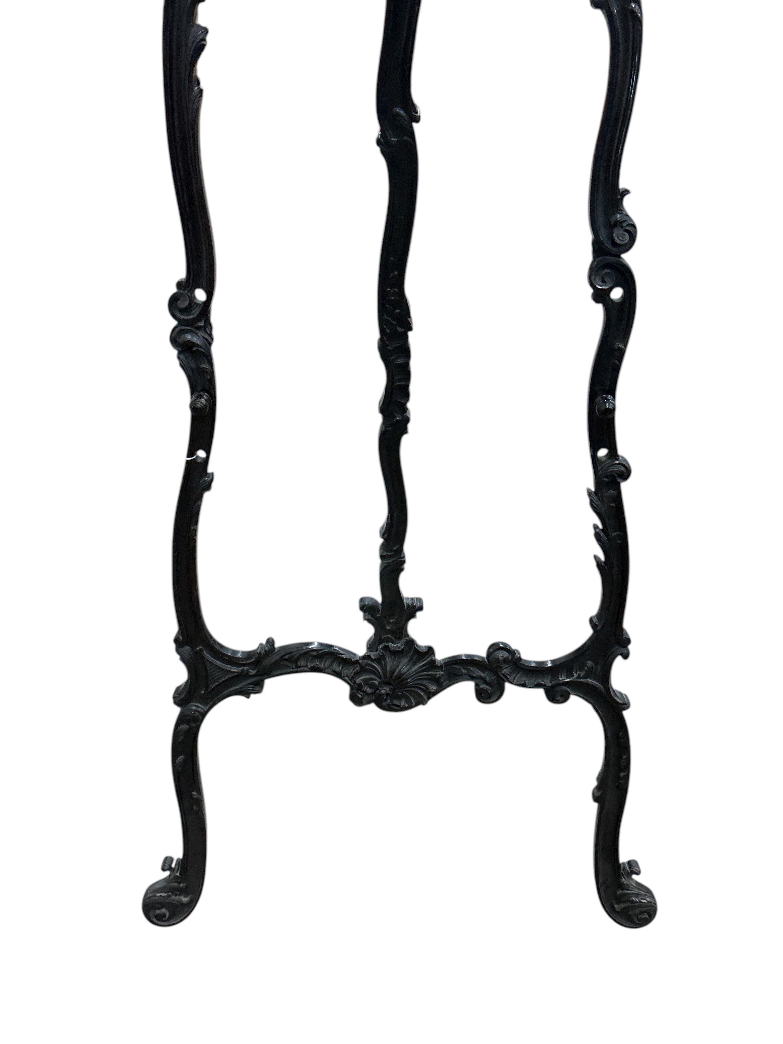 A Chippendale Revival mahogany easel, width 76cm, height 180cm